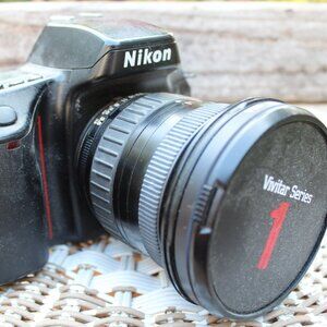 Nikon camera with fisheye lens (no battery) circa 1997